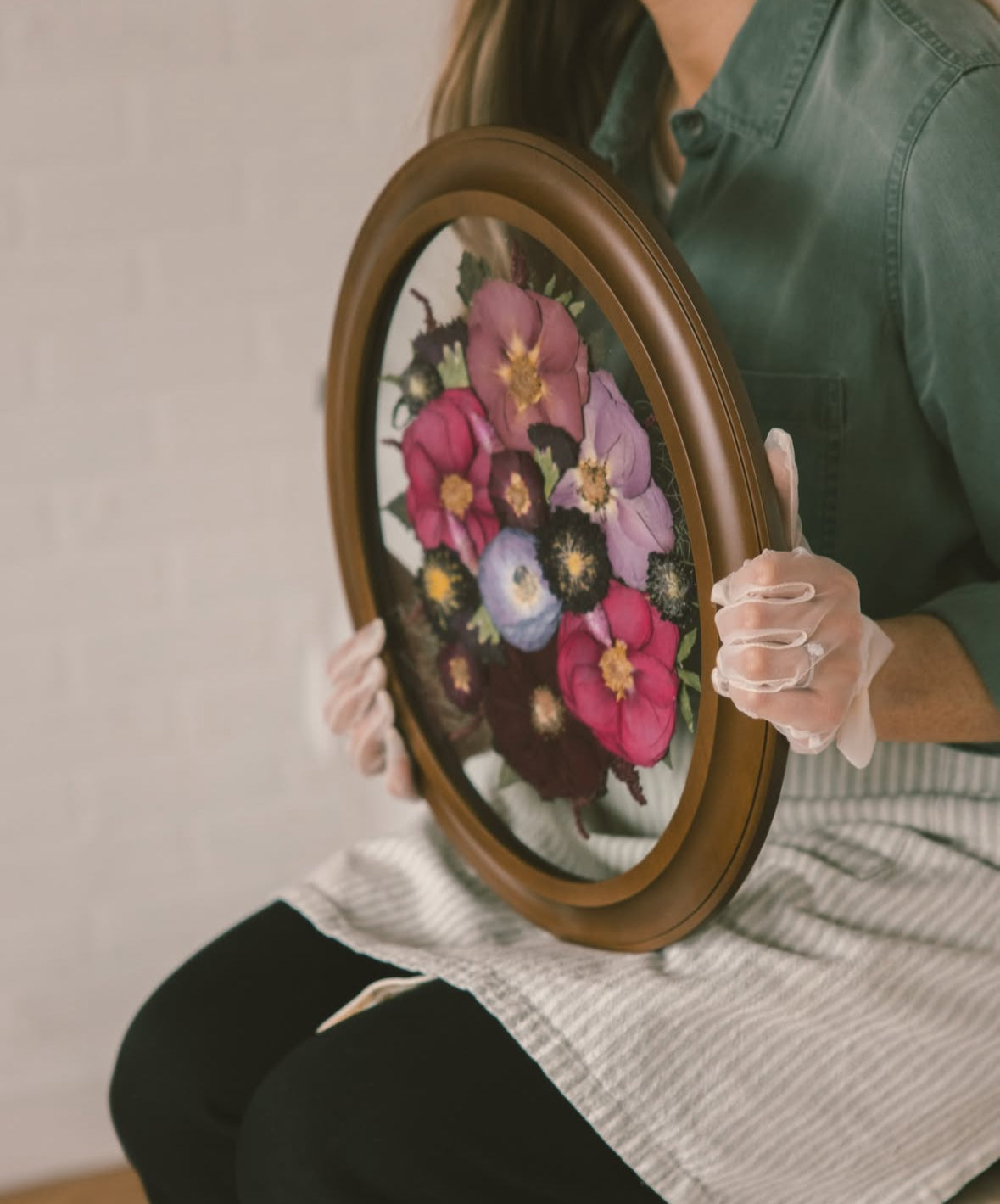 Preserved wedding bouquet in an oval frame